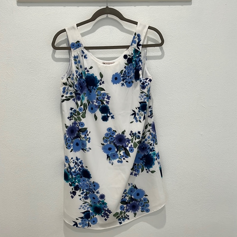 White dress with blue flowers